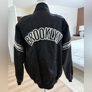 STARTER Men's Brooklyn Nets Black Varsity Jacket with White Accents